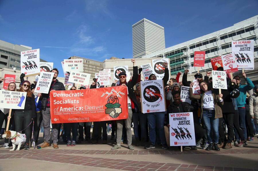 Denver DSA members protesting for reproductive justice.